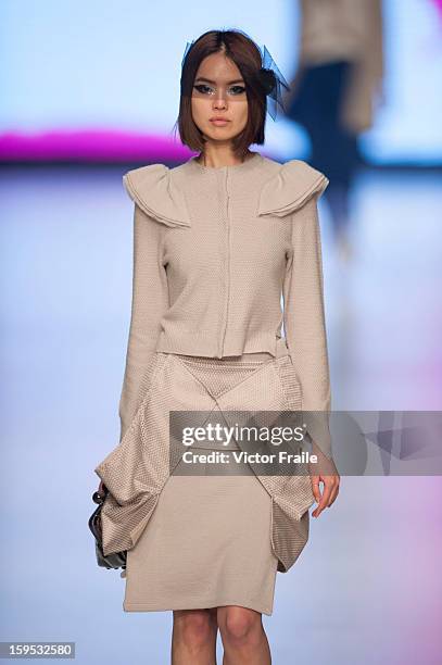 Model showcases designs on the runway by Johanna Ho during the Extravaganza show on day 1 of Hong Kong Fashion Week Autumn/Winter 2013 at the...