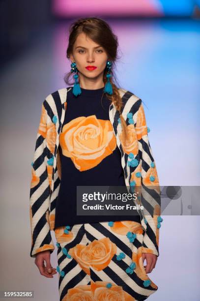 Model showcases designs on the runway by Holly Fulton during the Extravaganza show on day 1 of Hong Kong Fashion Week Autumn/Winter 2013 at the...