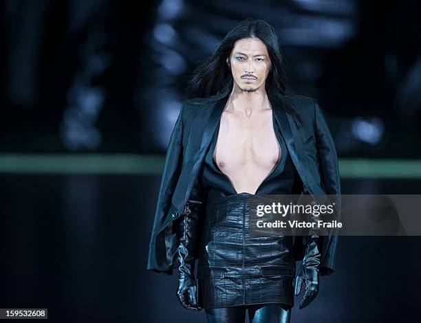 Model showcases designs on the runway by Chi Zhang during the Extravaganza show on day 1 of Hong Kong Fashion Week Autumn/Winter 2013 at the...