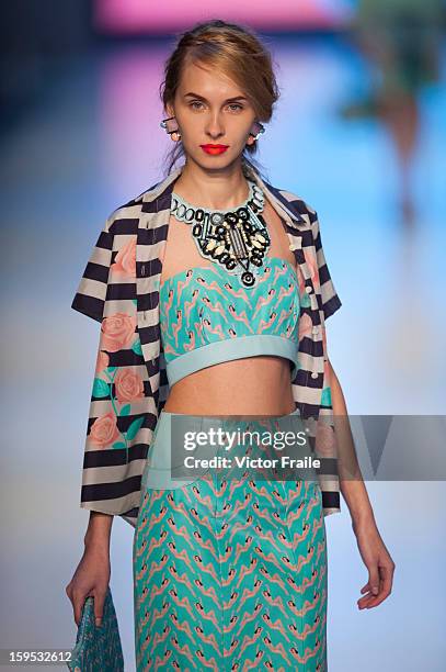 Model showcases designs on the runway by Holly Fulton during the Extravaganza show on day 1 of Hong Kong Fashion Week Autumn/Winter 2013 at the...