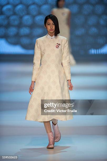 Model showcases designs on the runway by Nana Aganovich & Brooke Taylor during the Extravaganza show on day 1 of Hong Kong Fashion Week Autumn/Winter...