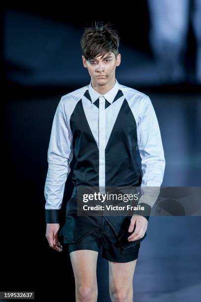 Model showcases designs on the runway by Chi Zhang during the Extravaganza show on day 1 of Hong Kong Fashion Week Autumn/Winter 2013 at the...