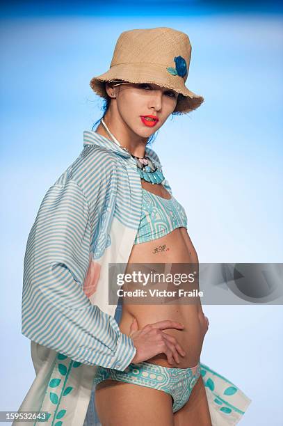 Model showcases designs on the runway by Holly Fulton during the Extravaganza show on day 1 of Hong Kong Fashion Week Autumn/Winter 2013 at the...