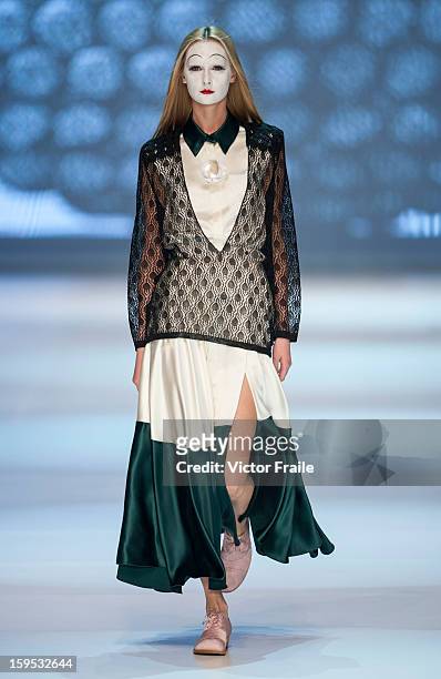 Model showcases designs on the runway by Nana Aganovich & Brooke Taylor during the Extravaganza show on day 1 of Hong Kong Fashion Week Autumn/Winter...