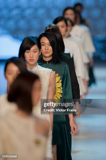 Model showcases designs on the runway by Nana Aganovich & Brooke Taylor during the Extravaganza show on day 1 of Hong Kong Fashion Week Autumn/Winter...