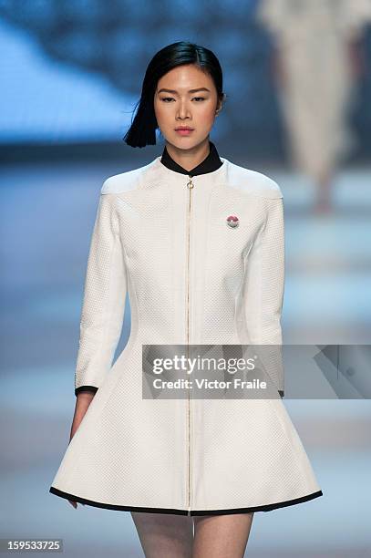 Model showcases designs on the runway by Nana Aganovich & Brooke Taylor during the Extravaganza show on day 1 of Hong Kong Fashion Week Autumn/Winter...