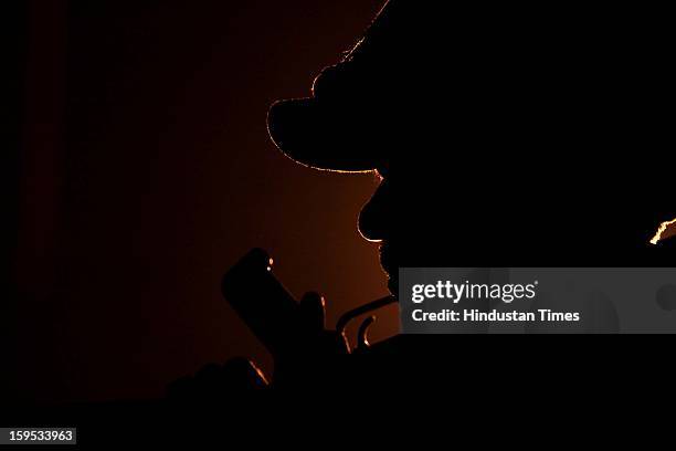 Indian Border Security Force soldier stand guard during night patrol near the fenced border with Pakistan at Abdullian on January 14, 2013 about 40...