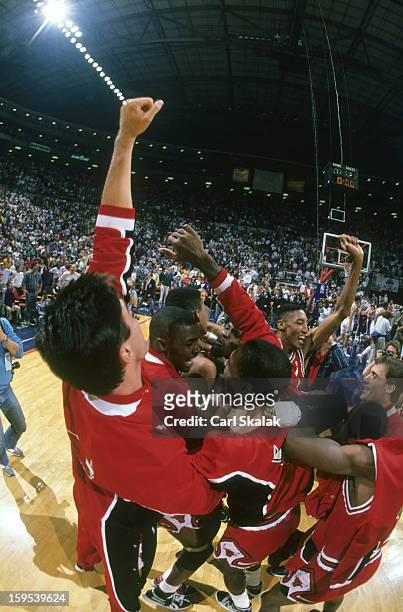 Playoffs: Chicago Bulls Jack Haley , Horace Grant , Bill Cartwright , Scottie Pippen , John Paxson , and teammates victorious on court after winning...