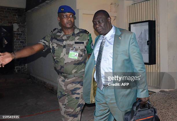 Seleka rebel coalition chief Michel Djotodia is welcomed by leader of the FOMAC Jean Felix Akaga in Bangui on January 15, 2013. The Seleka rebel...