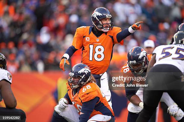 Playoffs: Denver Broncos QB Peyton Manning at line of scrimmage during game vs Baltimore Ravens at Sports Authority Field at Mile High. Denver, CO...