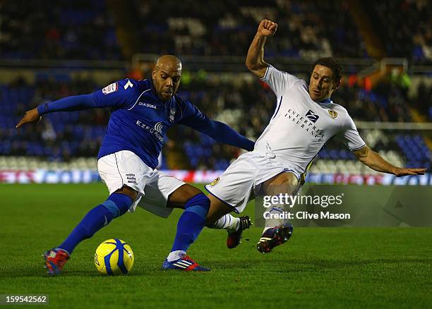 Marlon King of Birmingham City is tackled by Michael Brown of Leeds United during the FA Cup with Budweiser Third Round Replay match between...