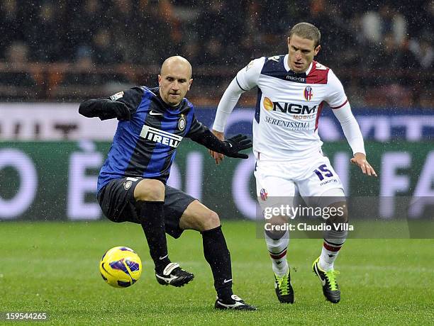 Tommaso Rocchi of FC Inter Milan and Diego Perez of Bologna FC compete for the ball during the TIM cup match between FC Internazionale Milano and...