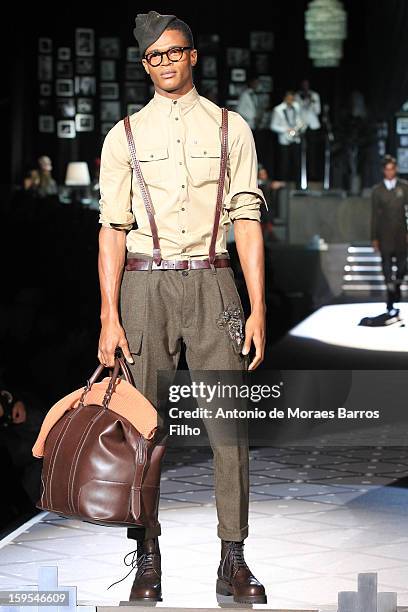 Model walks the runway during the DSquared2 show as a part of Milan Fashion week Menswear Autumn/Winter 2013 on January 15, 2013 in Milan, Italy.