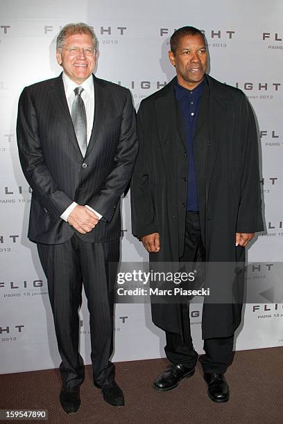 Director Robert Zemeckis and actor Denzel Washington attend the 'Flight' Paris Premiere at Cinema Gaumont Marignan on January 15, 2013 in Paris,...