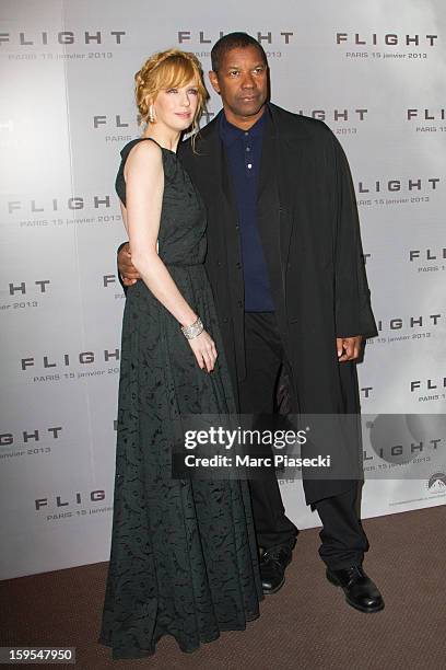 Actress Kelly Reilly and actor Denzel Washington attend the 'Flight' Paris Premiere at Cinema Gaumont Marignan on January 15, 2013 in Paris, France.