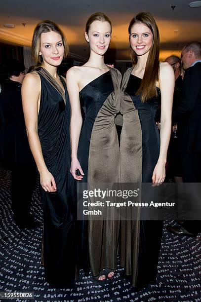 Elle models Isis Niedecken, Sonja Wohlmuth and Julia Kruse attend the Elle Soiree Privee during the Mercedes-Benz Fashion Week at the Waldorf Astoria...