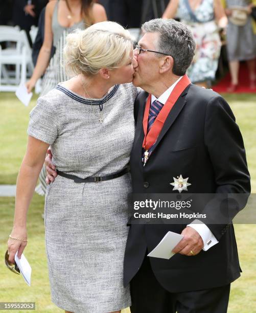 Sir Paul Holmes kisses his wife Lady Deborah after receiving a Knighthood from Governor-General Sir Jerry Mateparae in recognition of his services to...