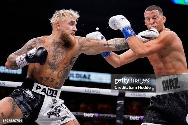 Jake Paul throws a left at Nate Diaz during the first round of their fight at the American Airlines Center on August 05, 2023 in Dallas, Texas.