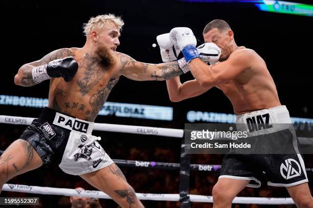 Jake Paul throws a left at Nate Diaz during the first round of their fight at the American Airlines Center on August 05, 2023 in Dallas, Texas.