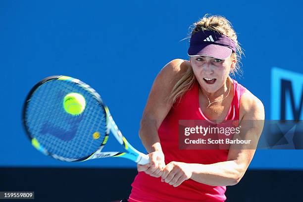 Ksenia Pervak of Kazakhstan plays a backhand in her second round match against Heather Watson of Great Britain during day three of the 2013...