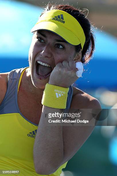 Sorana Cirstea of Romania celebrates in her second round match against Kristyna Pliskova of the Czech Republic during day three of the 2013...