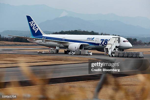 Boeing Co. 787 Dreamliner aircraft operated by All Nippon Airways Co. Stands on the tarmac after making an emergency landing at Takamatsu airport in...