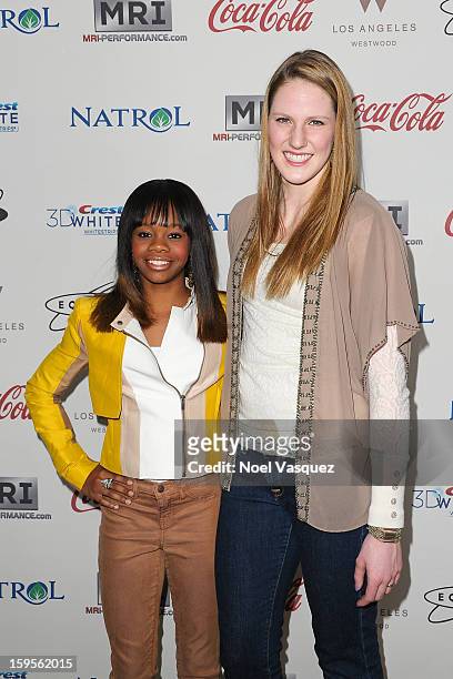 Gabby Douglas and Missy Franklin attend the 'Gold Meets Golden' event hosted at Equinox on January 12, 2013 in Los Angeles, California.