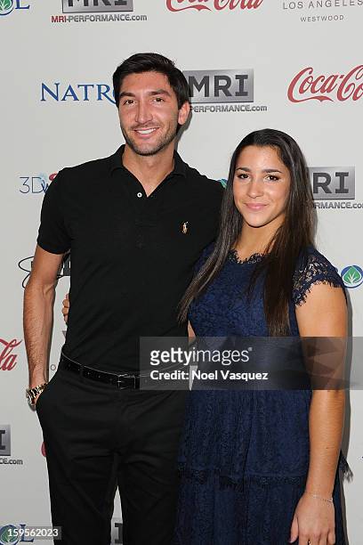 Evan Lysacek and Aly Raisman attend the 'Gold Meets Golden' event hosted at Equinox on January 12, 2013 in Los Angeles, California.