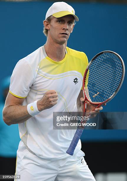 South Africa's Kevin Anderson reacts after a point against Russia's Andrey Kuznetsov during their men's singles match on day three of the Australian...