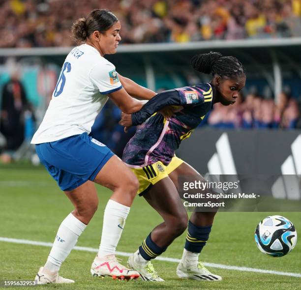 Colombia's Linda Caicedo under pressure from England's Jess Carter during the FIFA Women's World Cup Australia & New Zealand 2023 Quarter Final match...