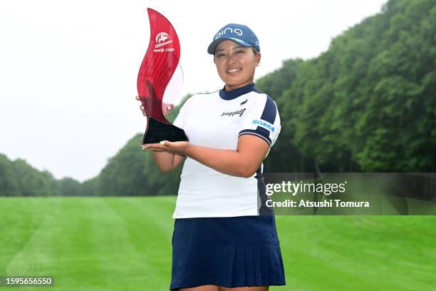 Ai Suzuki of Japan poses with the trophy after winning the tournament following the final round of Hokkaido meiji Cup at Sapporo International...