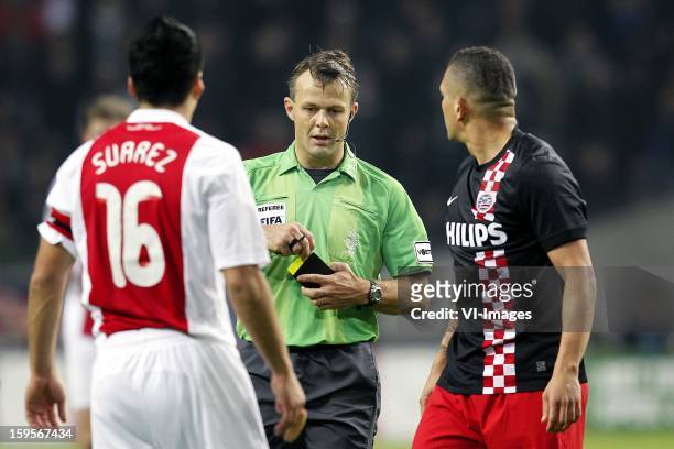 Ajax captain Luis Suarez was not sent off the pitch but later has accepted a seven-match ban for biting PSV Eindhoven midfielder Otman Bakkal's...
