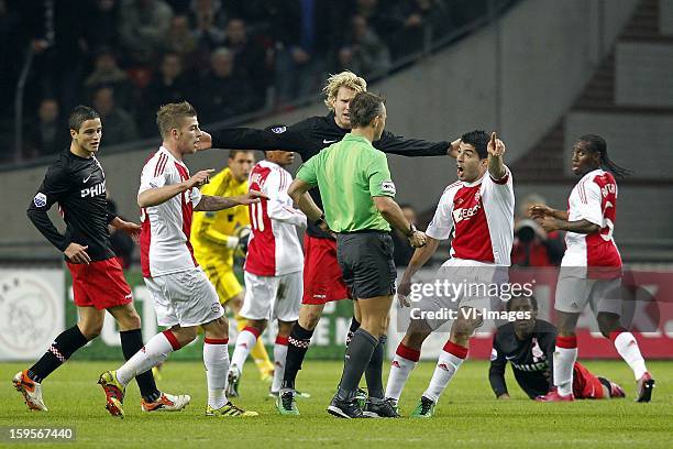 Ajax captain Luis Suarez was not sent off the pitch but later has accepted a seven-match ban for biting PSV Eindhoven midfielder Otman Bakkal's...