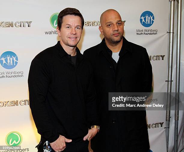 Mark Wahlberg and Director Allen Hughes attend the screening of "Broken City" hosted by Mark Wahlberg at Patriot Cinemas on January 15, 2013 in...