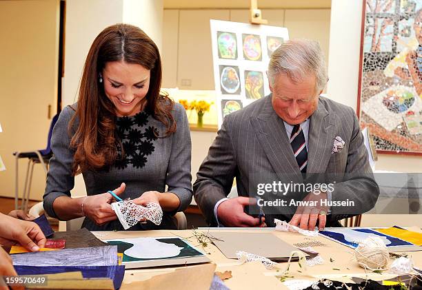 Catherine, Duchess of Cambridge and Prince Charles, Prince of Wales join children producing artwork during a visit to the Dulwich Picture Gallery on...