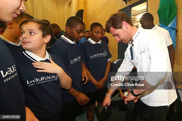 Andre Villas Boas gives football coaching to local school children during the Laureus Urban Research report launch on January 16, 2013 in London,...