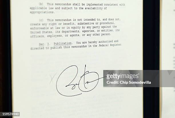 President Barack Obama signature appears on one of several executive orders he signed as part of the administration's new gun law proposals in the...