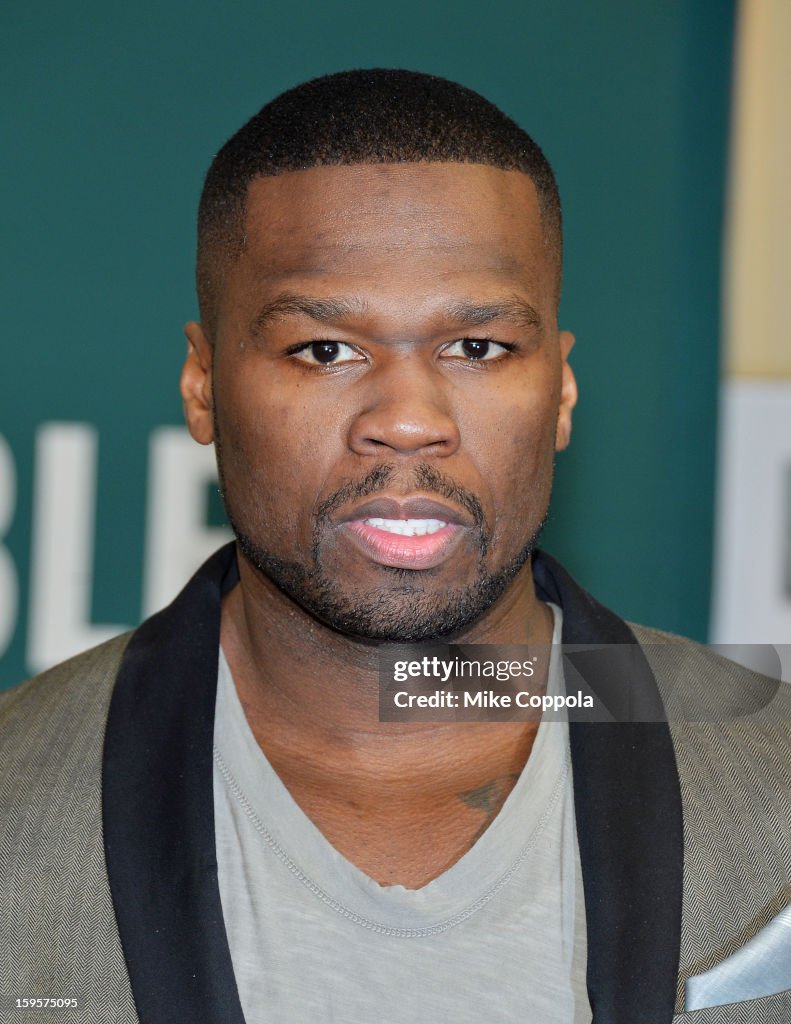 50 Cent Signs Copies Of His Book "Formula 50: A 6-Week Workout and Nutrition Plan That Will Transform Your Life"