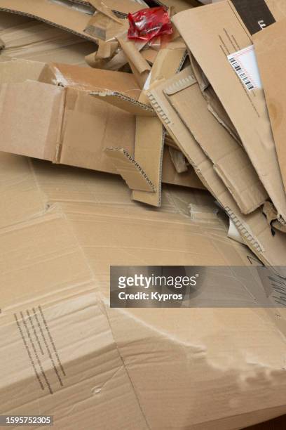 cardboard box ready to be recycled (or dumped) - mixed recycling bin stock pictures, royalty-free photos & images