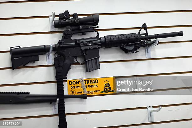 An AR-15 is seen for sale on the wall at the National Armory gun store on January 16, 2013 in Pompano Beach, Florida. President Barack Obama today in...