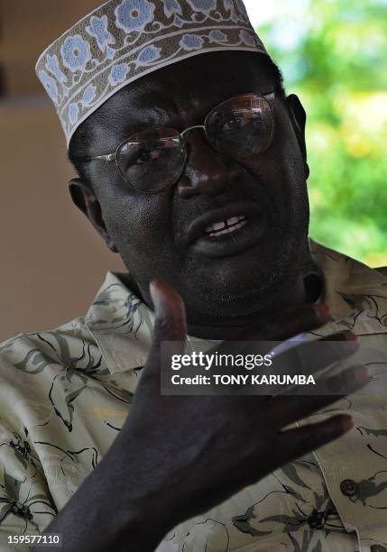 President Barack Obama's Kenyan half brother, Malik Obama speaks at an interview January 16, 2013 at the peaceful hamlet of Nyang'oma in Kogelo...