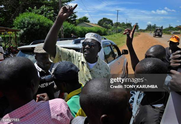 President Barack Obama's Kenyan half brother, Malik Obama rallies supporters on January 16, 2013 near Nyang'oma in Kogelo, now renowned as the...