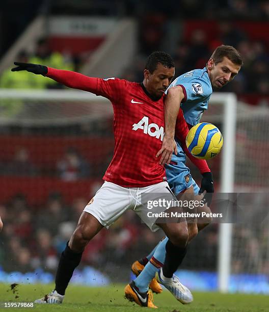 Anderson of Manchester United in action with Gary O'Neil of West Ham United during the FA Cup Third Round Replay between Manchester United and West...