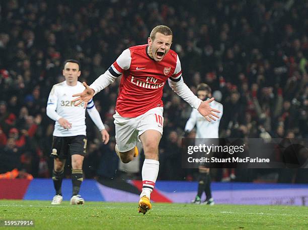 Jack Wilshere celebrates scoring the Arsenal goal during the FA Cup Third Round Replay match between Arsenal and Swansea City at the Emirates Stadium...