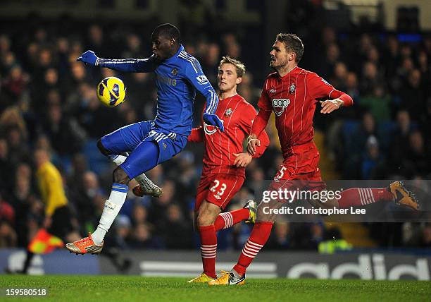 Demba Ba of Chelsea watches the ball before he takes a shot during the Barclays Premier League match between Chelsea and Southampton at Stamford...