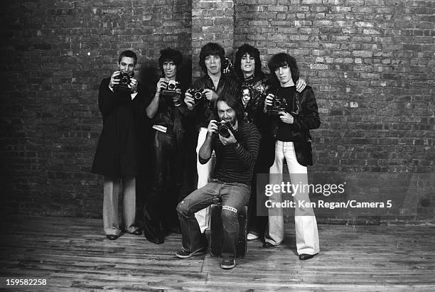 The Rolling Stones and photographer Ken Regan are photographed at the Camera 5 studios in 1977 in New York City. CREDIT MUST READ: Ken Regan/Camera 5...