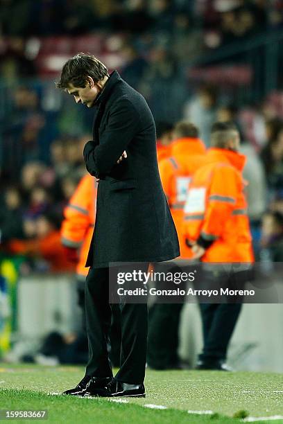 Head coach Tito Vilanova of Barcelona FC reacts defeated after Malaga CF socres its second goal during the Copa del Rey Quarter Final match between...