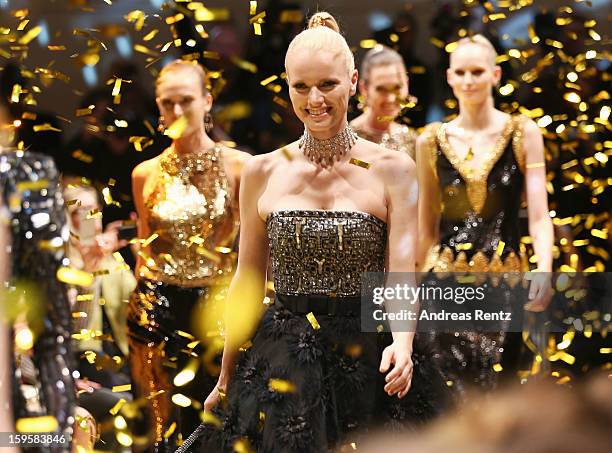 Models walk down the runway at Basler Autumn/Winter 2013/14 fashion show during Mercedes-Benz Fashion Week Berlin at Hotel De Rome on January 16,...