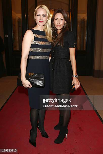 Judith Rakers and Angela Lanz attend Basler Autumn/Winter 2013/14 fashion show during Mercedes-Benz Fashion Week Berlin at Hotel De Rome on January...