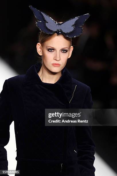 Model walks the runway at the Agne Kuzmickaite, Igrida Zabere, Kaetlin Kaljuvee Autumn/Winter 2013/14 fashion show during Mercedes-Benz Fashion Week...